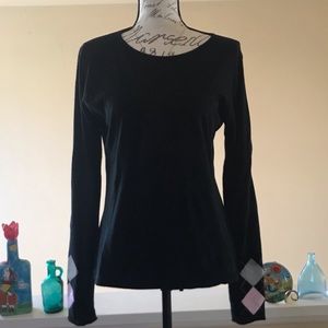 J black tee shirt with argyle print on sleeves